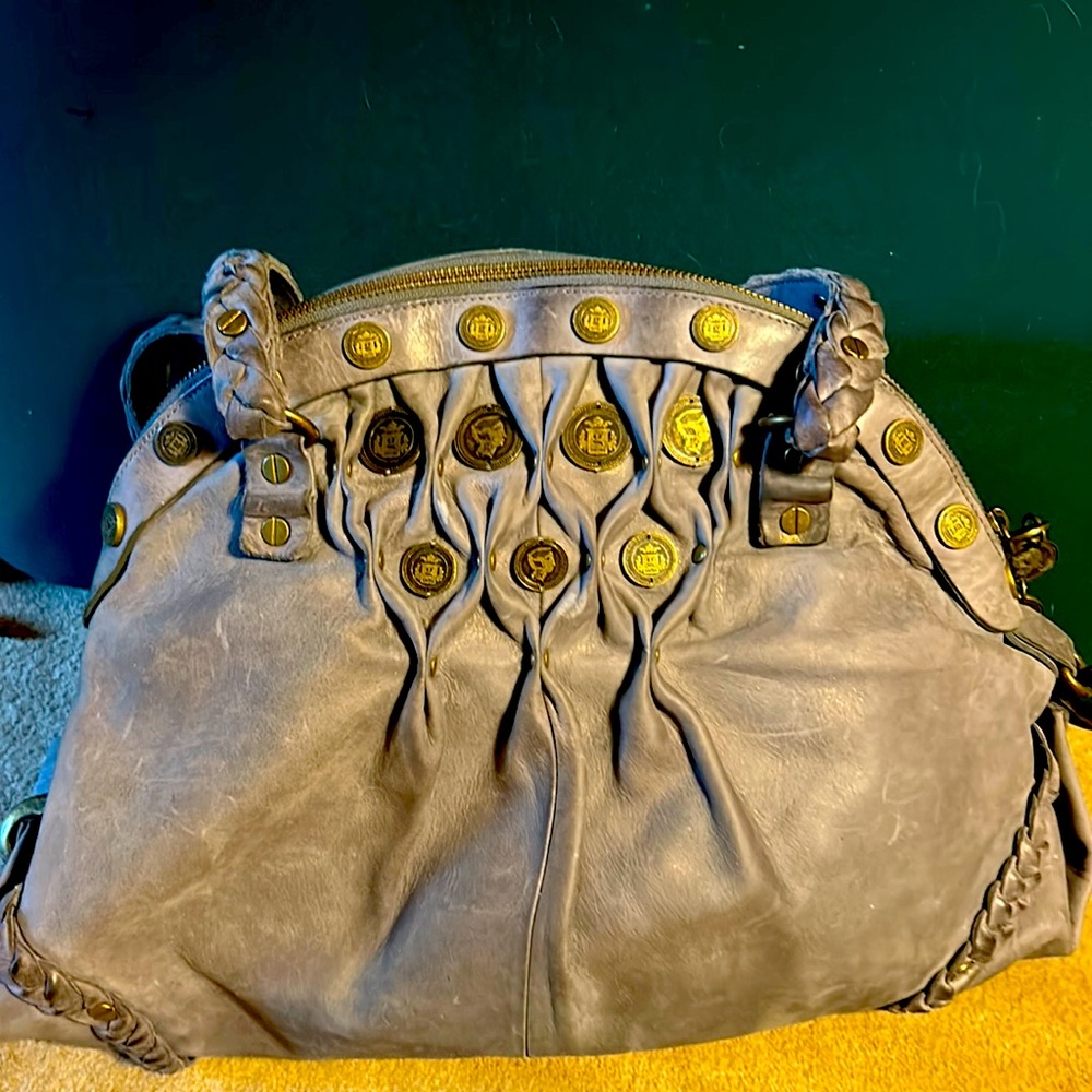 Preloved G Series Gray Leather purse with old gold coin design.